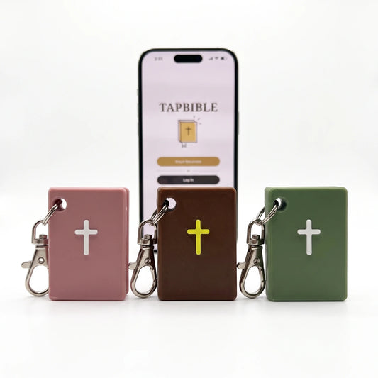TapBible Catholic NFC Bible keychains in Light Pink, Brown and Sage with a phone showing the TapBible app